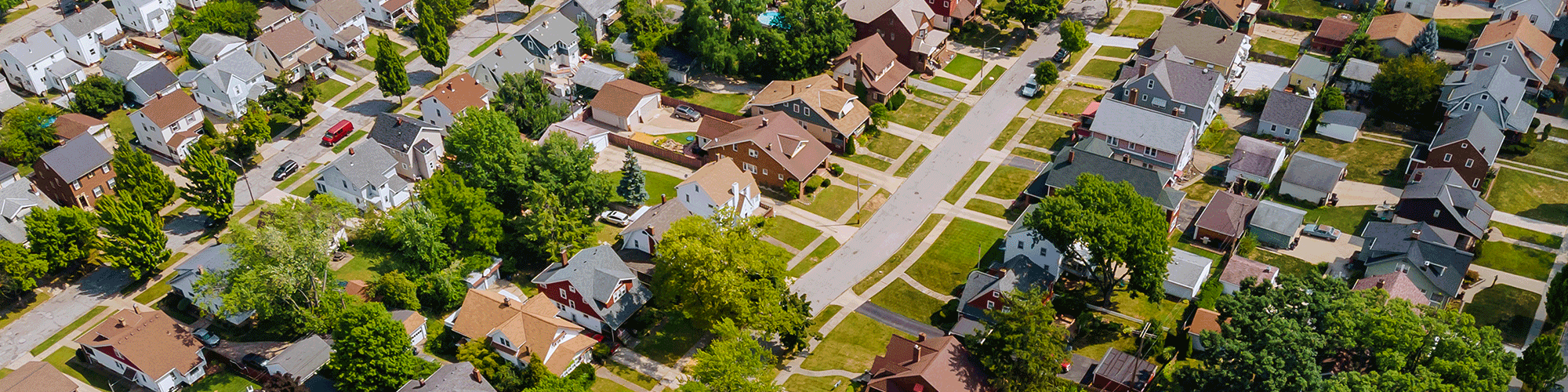 A top-down drone view of a suburban neighborhood